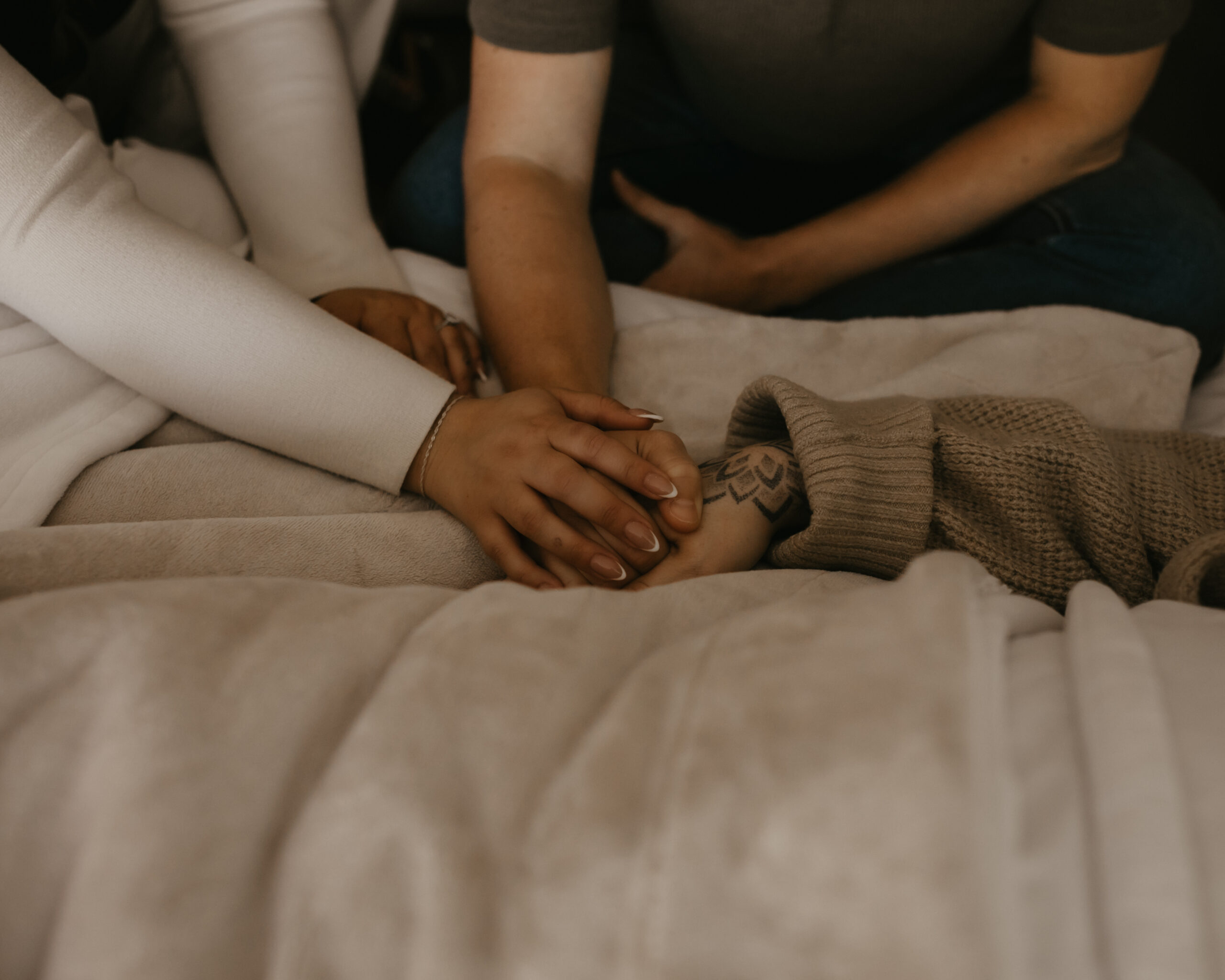 Healing Recovery Centre team holding hands with client through a hard time